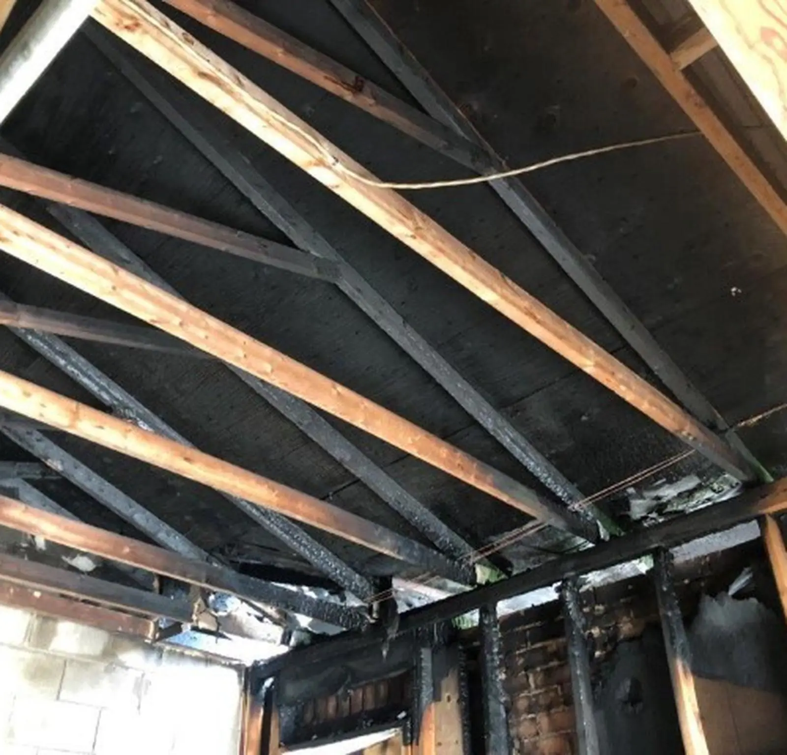 Fire-damaged garage before cleanup and repairs