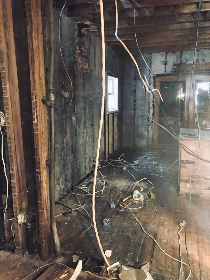 Fire-damaged kitchen before restoration
